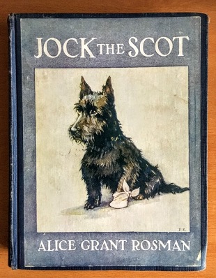 A picture containing dog, text, book, black

Description automatically generated